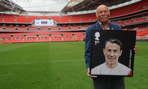 Greaves poses with his stamp during the Royal Mail stamp launch at Wembley in May 2013