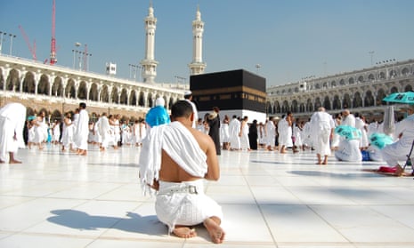 A pilgrim deep in prayer at the Kaaba in Mecca.