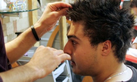 Iranian man getting haircut in Tehran
