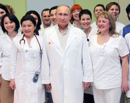 Vladimir Putin visits a maternity hospital in Lapino, near Moscow.