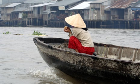 Woman on a boat on the Mekong River