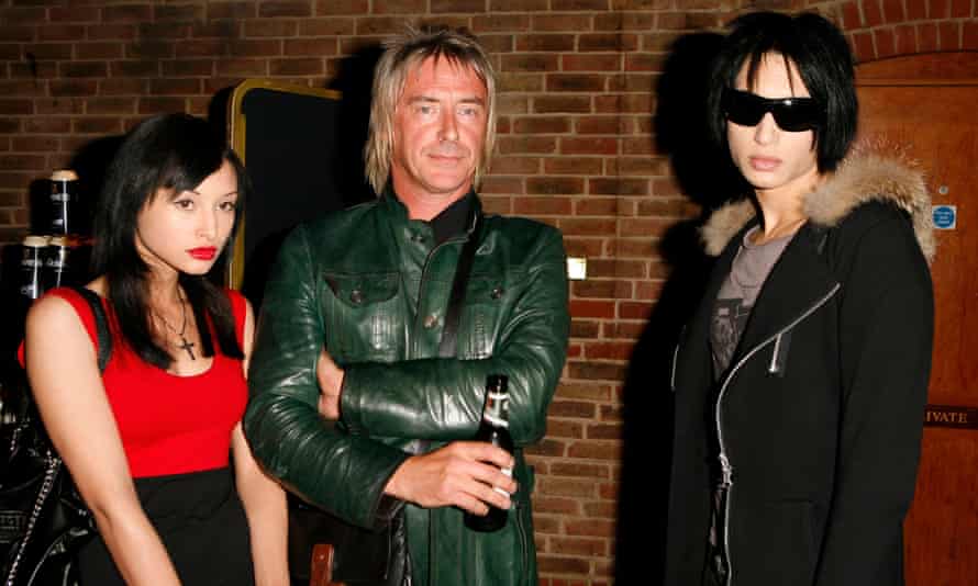 Family man: Paul Weller with two of his children Leah and Natt.