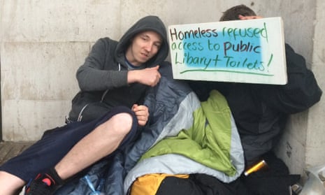 Homeless protesters in Manchester have been banned from entering the public library