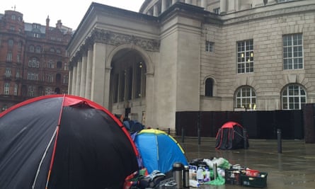 Homeless people in Manchester have set up camp outside the town hall and Central Library to demand housing