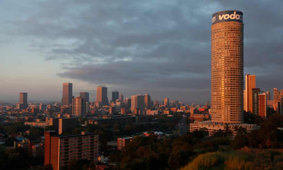 A landscape view of the city of downtown Johannesburg, featuring the Ponte Tower.