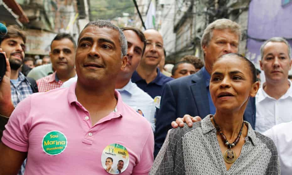 Romário, left, with Marina Silva in the Rocinha slum of Rio de Janeiro in August 2014.