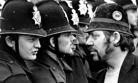 A striking miner faces a line of police at the Orgreave pit during the miners' strike in 1984. Photograph: Don McPhee
