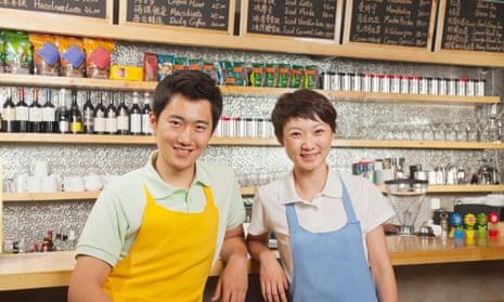 Two baristas at a coffee shop, Beijing.