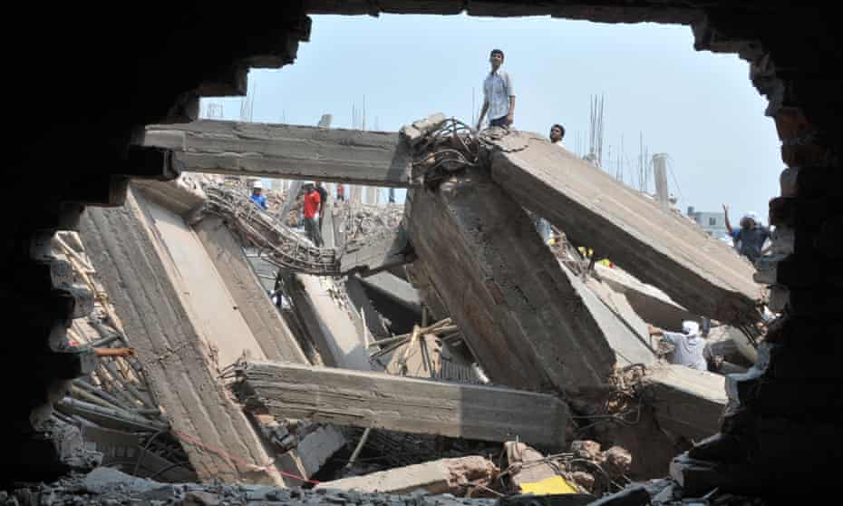 Rescuers work at the collapsed Rana Plaza in Dhaka in April 2013.