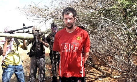 Michael Scott Moore surrounded by his Somali captors.