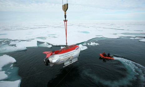 A Russian deep-diving miniature submarine is lowered from the research vessel Akademik Fyodorov moments before performing a dive in the Arctic Ocean beneath the ice at the North Pole in 2007.