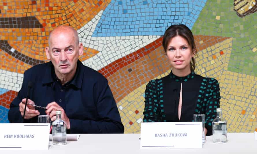 Rem Koolhaas and Dasha Zhukova take questions in front of a Soviet-era mosaic.