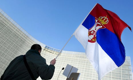 The Serbian flag waved outside European Union headquarters in Brussels.