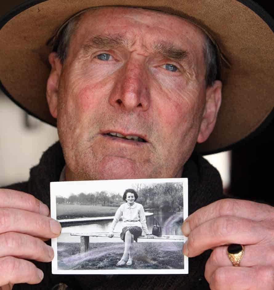 Irish writer John Pascal Rodgers, born in the home for unmarried mothers, poses with a photograph of his mother Bridie Rodgers, last year. Up to 800 babies and children were buried near the home run by nuns AFP PHOTO/PAUL FAITHPAUL FAITH/AFP/Getty Images