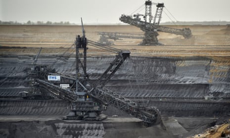 Giant machines dig for brown coal at an open-cast mine in Germany.