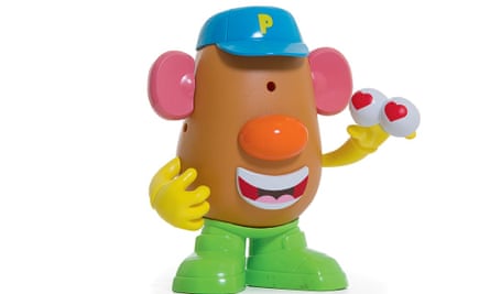 Mr Potato Head, holding a pair of eyeballs with hearts on them, clearly feeling self-love.