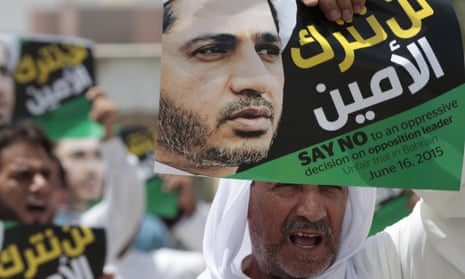Bahraini Shia Muslims chant slogans during a march in support of prominent jailed opposition leader Sheikh Ali Salman