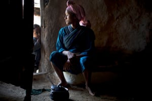 Mestawet Abey, who is 15 years, old,  poses for a photograph in her home,  as part of a UNICEF photo project to show Girls Empowerment in the village of Addis Ge, near Fiche, Ethiopia Saturday, Feb. 21, 2015. Mestawet got married when she was 13, She was forced to drop out of school by her parents to look after their cows and shortly afterwards got married. T