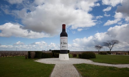 A large model of a wine bottle and vineyards near St Julien, Bordeaux.