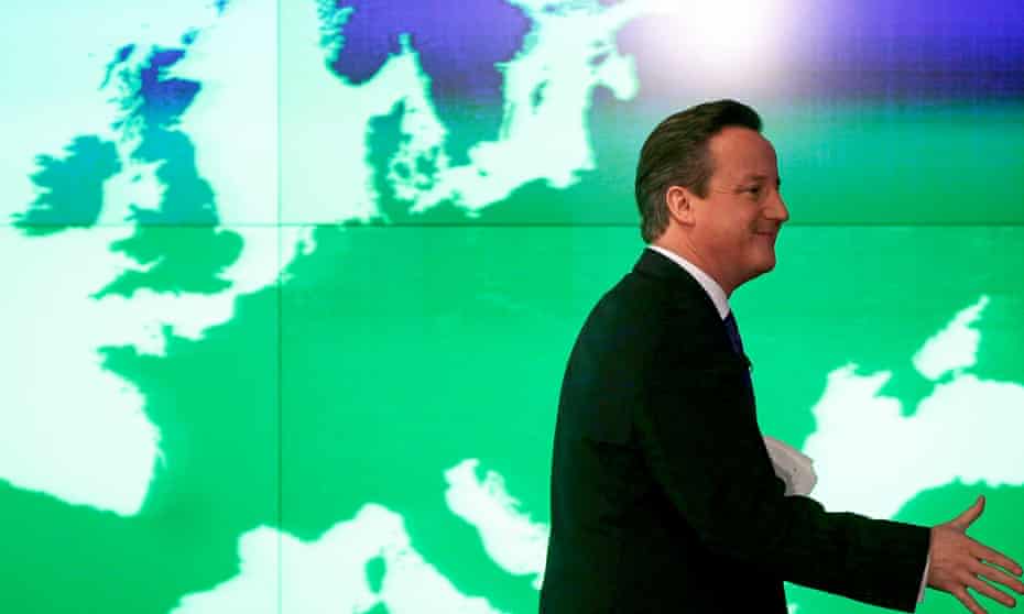 David Cameron passes a map of Europe at the Bloomberg offices in London, on 23 January 23, 2013.