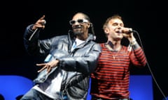 Snoop Dog (L) performs with Damon Albarn of Gorillaz on the Pyramid Stage at Glastonbury Festival 2010 