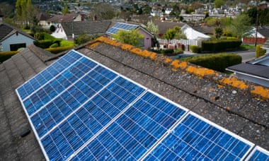 Solar panels on a roof in Totnes, Devon. Amber Rudd claims solar power is just as cost-effective as onshore wind.