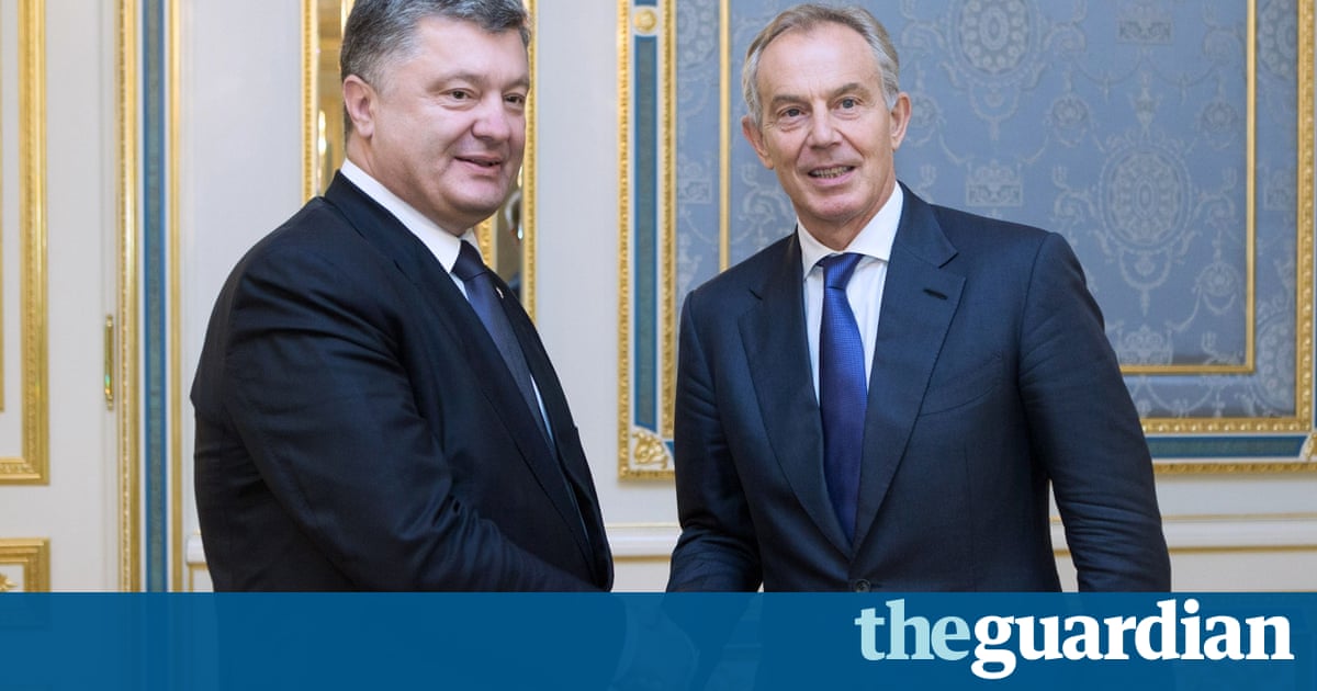 Ukrainian president Petro Poroshenko with Tony Blair in Kiev. Photograph: Mykhaylo Markiv/AFP/Getty