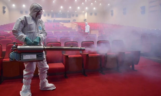 South Korean health officials fumigate a theatre in<br>Seoul in an attempt to combat the Mers virus. <br>