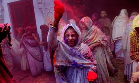 Widows take part in the Holi festival in Vrindavan