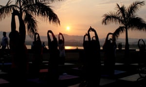 People take part in a mass yoga session in Chandigarh , India