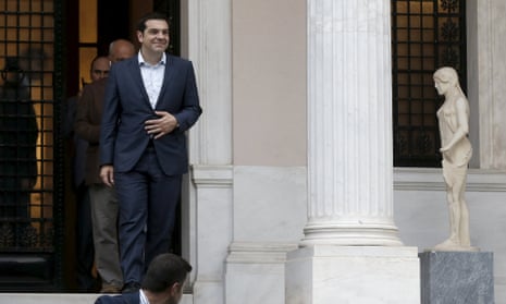 The Greek prime minister, Alexis Tsipras, leaves his office in Athens on Sunday.
