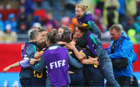 Australia players celebrate victory.