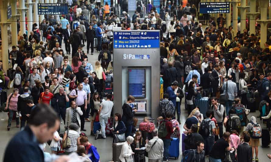 People fill the Eurostar terminal at St Pancras station in London after disruption on the French side of the Channel Tunnel caused all services to be cancelled