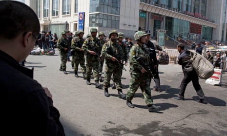 Chinese paramilitary police on patrol after a previous attack in Xinjiang, the Uighur region of China.
