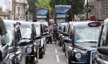 black cabs in London traffic