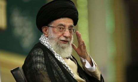Supreme Leader Ayatollah Ali Khamenei, waves during a meeting in Tehran last September (AP Photo/Office of the Supreme Leader)