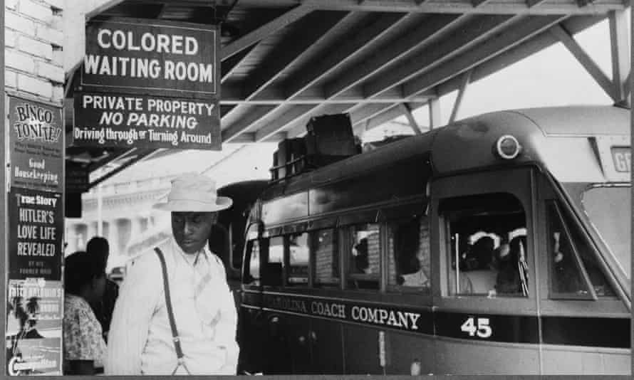 Photo showing the Jim Crow signs of racial segregation, Durham, North Carolina, May 1940.
