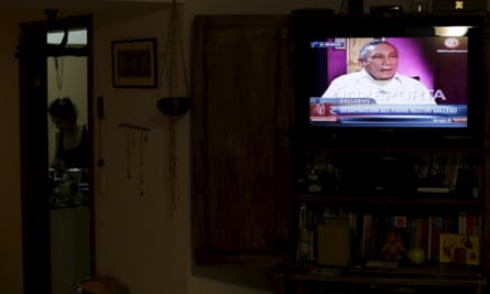 Manuel Noriega is seen on a television screen in Panama City during his interview.