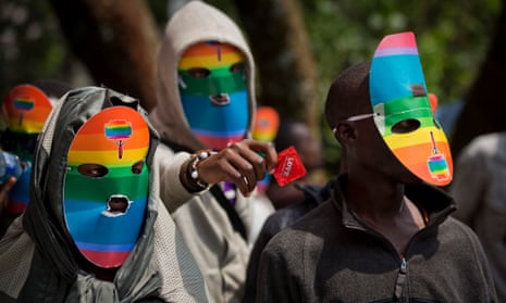 Kenyan gays and lesbians wear masks to preserve their anonymity during a rare protest in 2014.