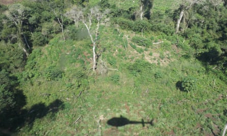 The shadow of a Senad helicopter is seen as the agency seeks out marijuana plantations.