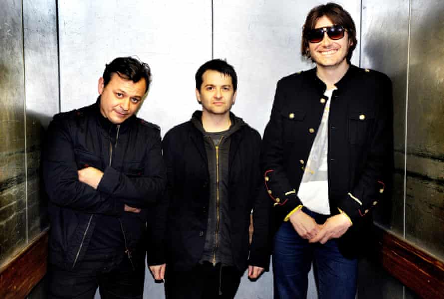 James Dean Bradfield, Sean Moore and Nicky Wire of Manic Street Preachers in 2013.