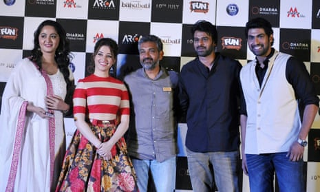 Anushka Shetty, Tamannaah Bhatia, Prabhas  and Rana Daggubati pose with writer and director SS Rajamouli (centre) at the trailer launch for Baahubali