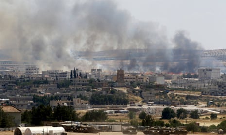 Smoke rises in the Syrian town of Kobani.