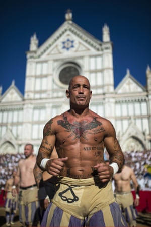 Players from the Santo Spirito Bianchi team prepare for the final of the Calcio Storico in Florence, Italy.