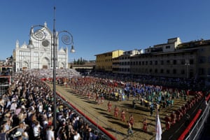 The players and officials enter Santa Croce square for the final which is played on a field of sand with 27 players on each side.