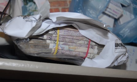 Almost £60,000 in cash was seized by police along with cocaine with a street value of £750,000.
