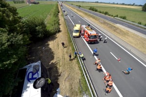 Bus lies on its side after crash in Middelkirke, Belgium