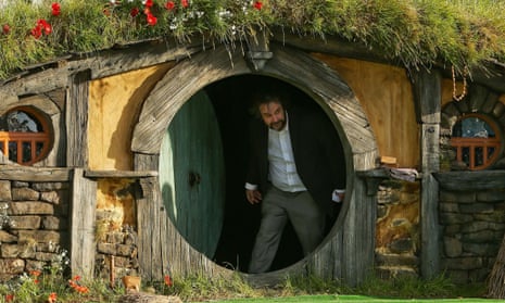 Peter Jackson leaving a Hobbit House in 2012.