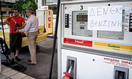 A notice at a petrol station in Athens reads 'NO Fuel'.