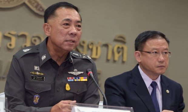 Thai police General Aek Angsananont, left, gives a press conference on the country's anti-trafficking operations.